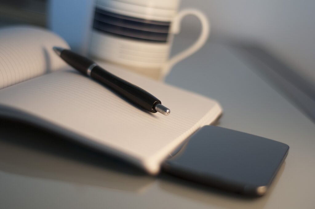 Notepad and pen.